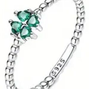 Elegant Silver Ring with Green Gemstones